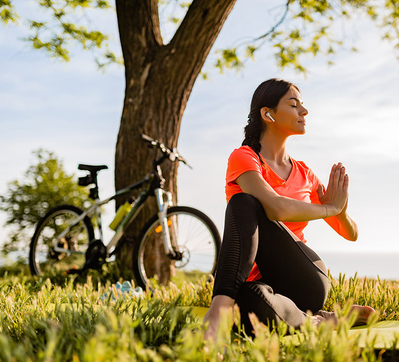 slim-beautiful-woman-doing-sports-morning-park-doing-yoga